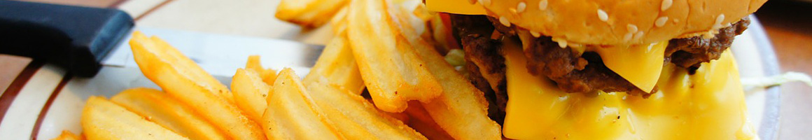 Eating American (Traditional) Burger Fast Food at Jimmy Jacks Hamburgers restaurant in Phoenix, AZ.
